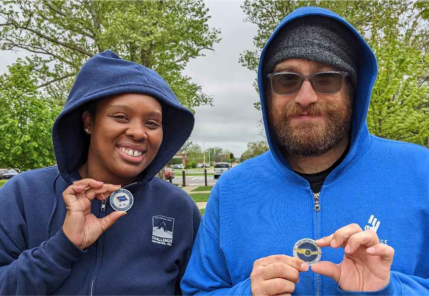 Custodians Vanessa and John were presented coins for their outstanding service to Scott Air Force Base.